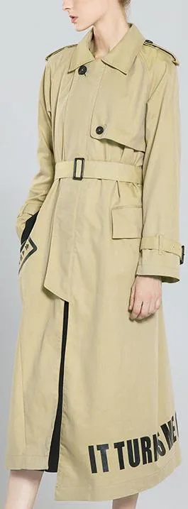 'It Turns Me On' Printed Trench Coat